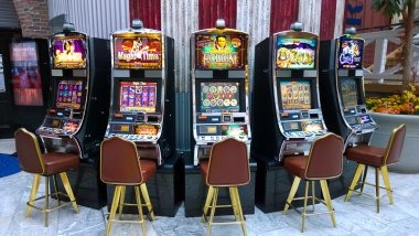 Slot game interface showing Aviator and Sweet Bonanza
